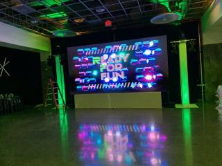 Bar Mitzvah Boy’s Initials Inspire Clever Taglines at Unique Glow Mitzvah